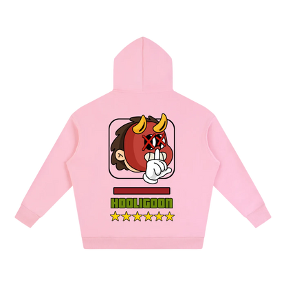 A light pink hoodie shown from the back, featuring a colorful graphic of a cartoon devil character making a peace sign, with the text 'KOOLIGOON' and five stars below.