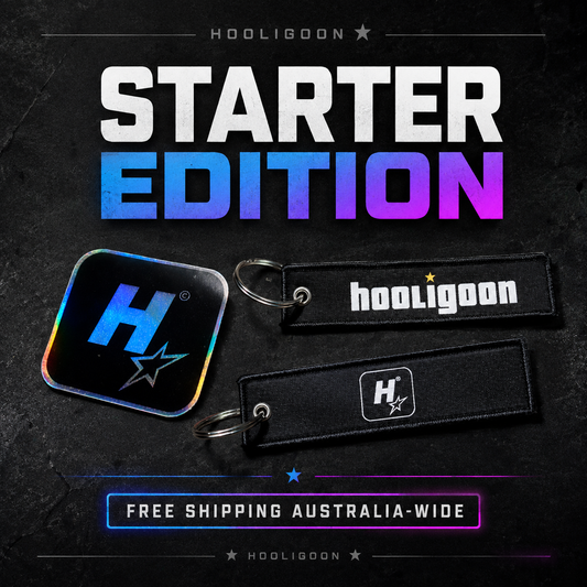 Hooligoon Starter Edition promotional graphic showing a black square acrylic keychain with a holographic iridescent 'H' logo and a matching black woven key strap with white 'hooligoon' text, on a dark textured background with large 'STARTER EDITION' text and 'FREE SHIPPING AUSTRALIA-WIDE' banner.